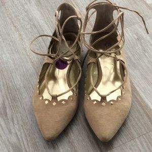 Carlos Santana lace up flat.